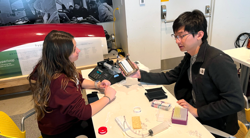 At Beaver Works Center, MIT students work on the droplet-dispensing manifold, a project which focused on developing simple high-throughput tools with integrated environmental control systems.